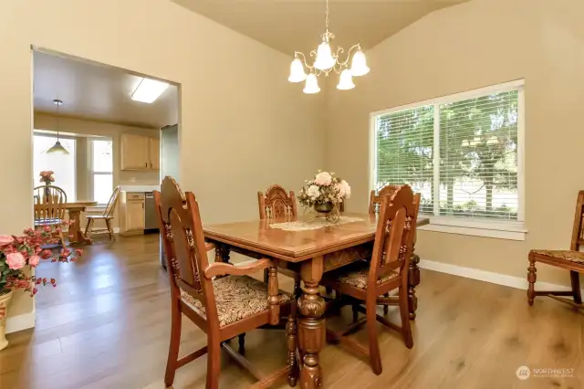 Formal dining room looking into kitchen