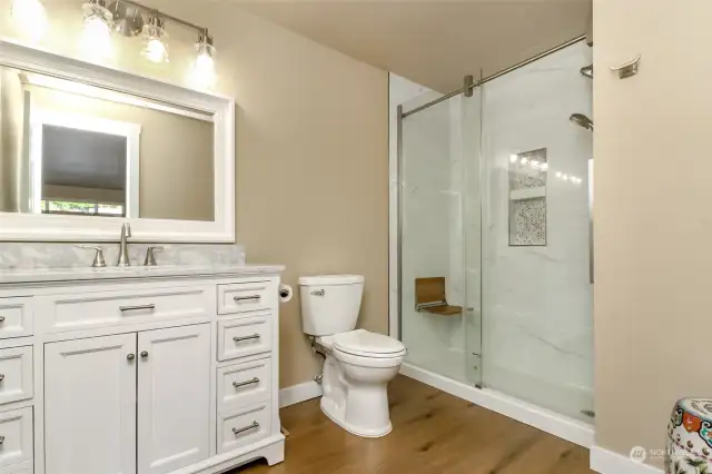 Updated bathroom with easy access shower