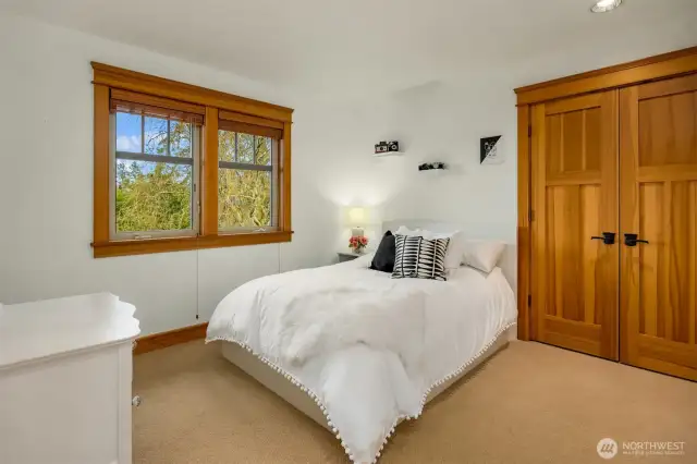 One of two guest bedrooms. California closets in all the closets upstairs.