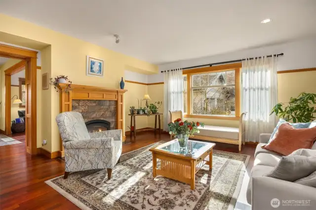 Living room is full of natural light from the generous south and west facing windows.