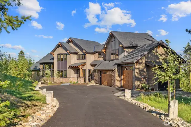 See you at the top of gated Skyline Ridge! Incredible attention to detail and superior finish work are combined in this surprisingly livable luxury mountain home. No detail has been forgotten - all the way to the three car garage, one Bay designed as a shop with 220 V electric with a space heater, EV ready hook up, and mechanical room plumbed for dog wash.  There is also a whole house fan and a generator!