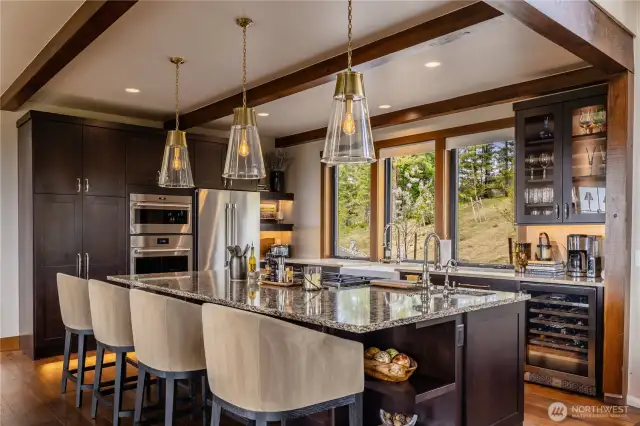A cook's kitchen with seating at the island is the perfect way to create lasting memories.