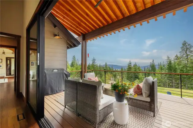 A large slider to open great room to the outside - this deck has heaters and is plumbed for a BBQ.