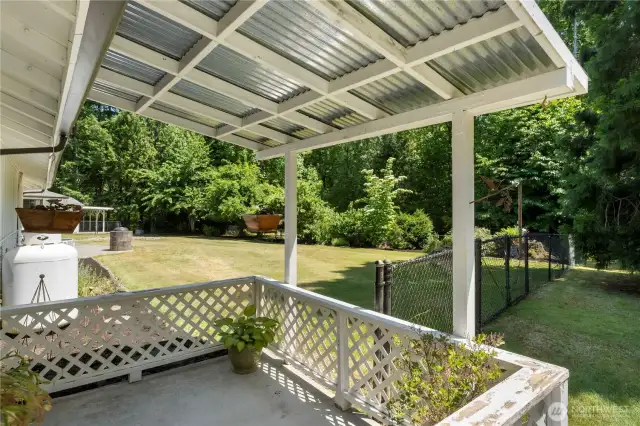 Private covered porch off the ADU.