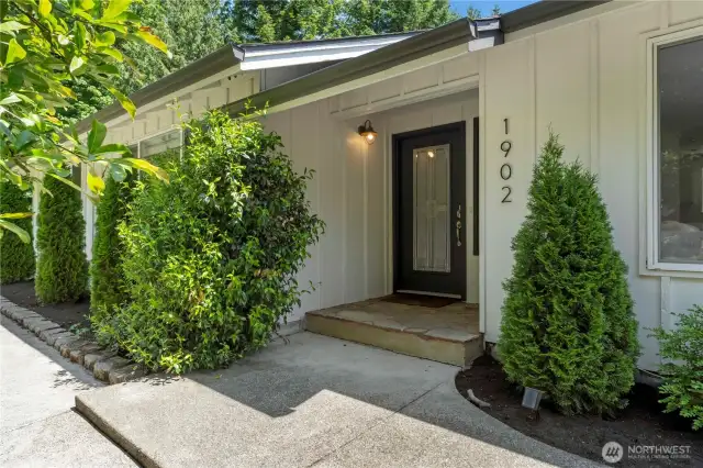 Covered front porch greets you upon entry.