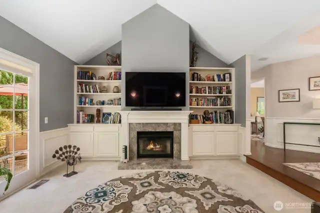 ...& a cozy fireplace with built-in bookshelves!