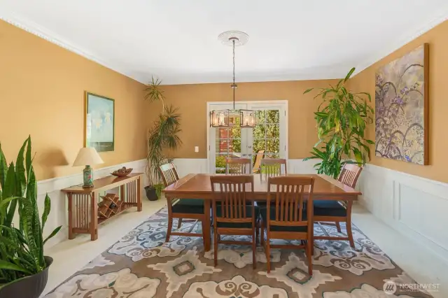 Formal dining room on your right as you head down the hall from the living room.
