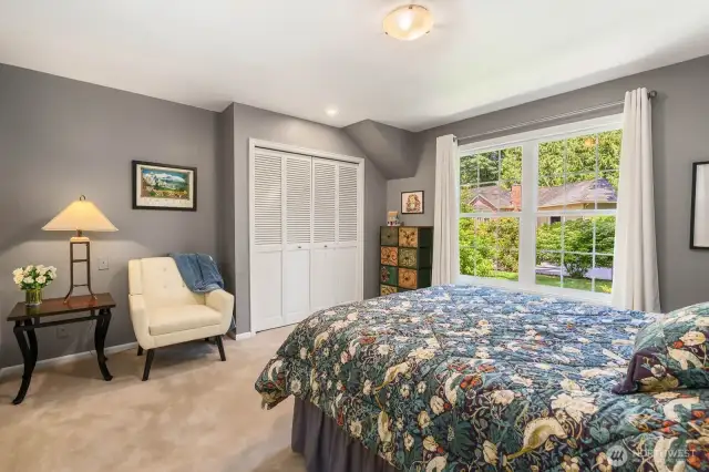 Comfort, style & a window looking out at the greenery.