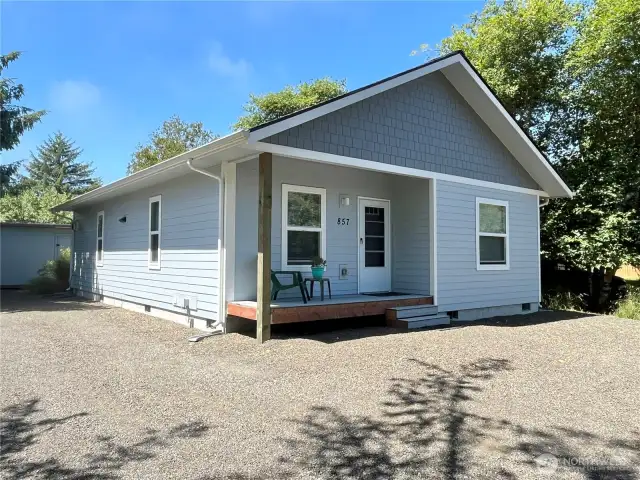 Covered porch makes a great spot to watch the deer slowly walk by. Listen to the Ocean Roar from the comfort of your cozy beach cottage