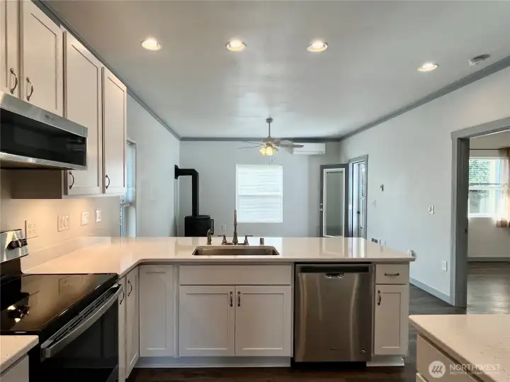 Inside you are greeted by an open concept   design where the kitchen, dining and living   room flow seamlessly.