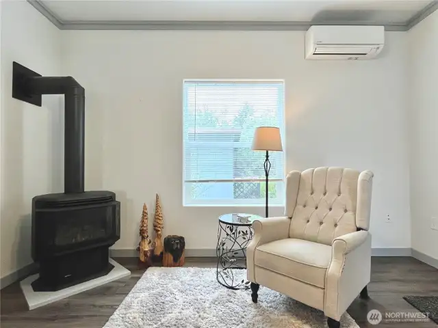 Classic Coastal Living Room with Propane Burning Stove, wall heaters and Mini-Split Heat / AC for ultimate comfort