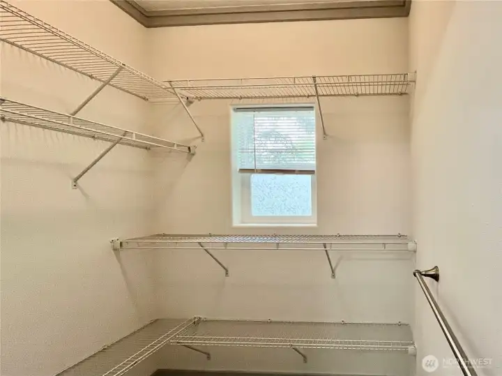 Huge walk-in closet with lots of storage   space
