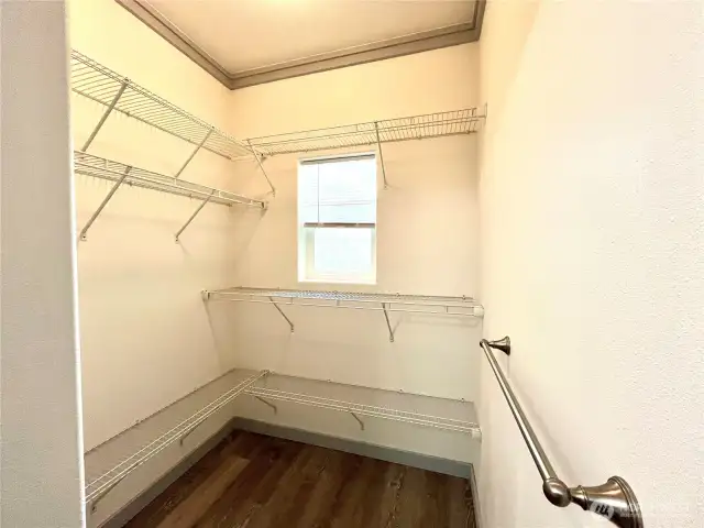 Huge walk-in closet with lots of storage space to keep you organized.