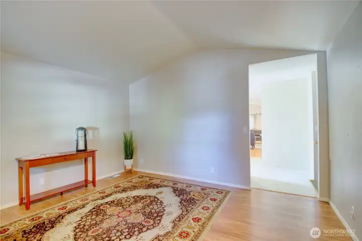 Dining room or reading room as you enter the home.