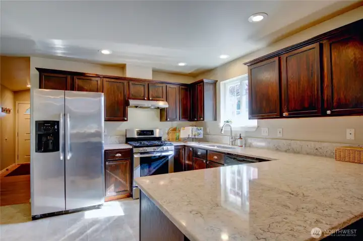 Nicely updated kitchen with granite counters, stainless appliances.