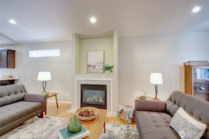 Living room with vaulted ceiling.
