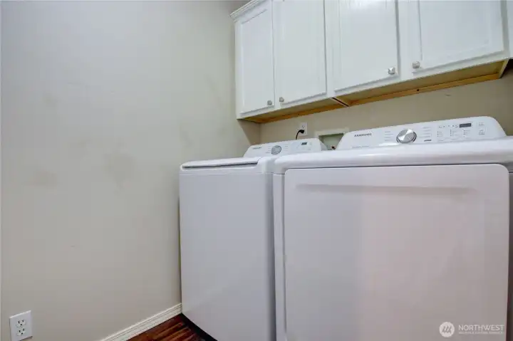 Separate laundry room within the home close to the bedrooms.