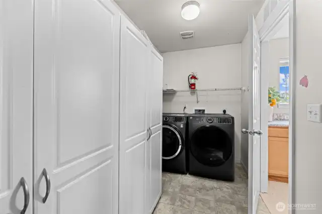 mud room and pantry with new washer and dryer