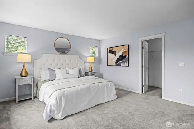 main suite with fireplace and sitting area