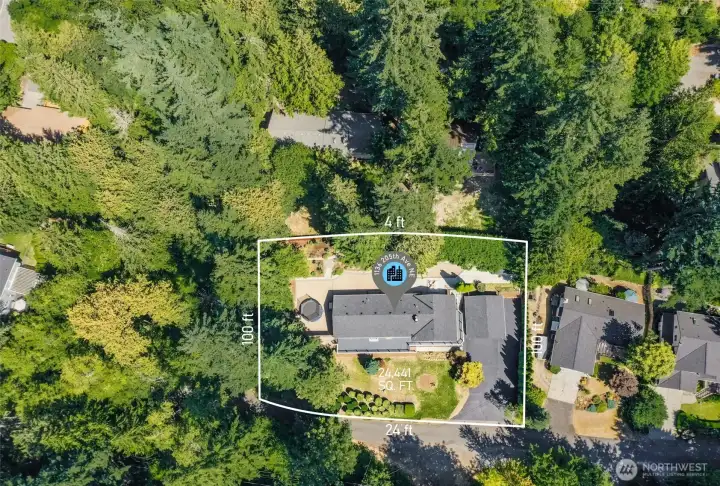 Bird’s-eye view showcasing mature trees and setting and the lot size of the property.