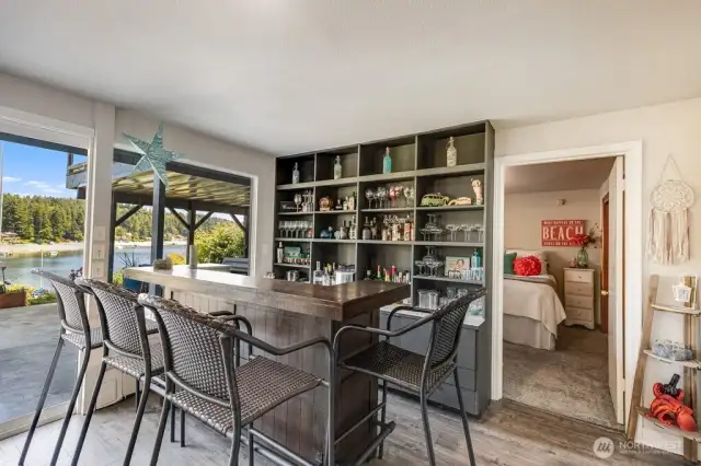 Bar area in Family room with views looking into 2nd bedroom
