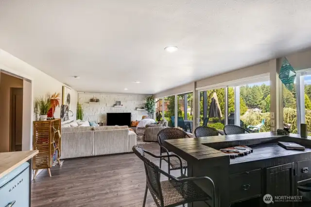 Family room with bar designed for entertaining