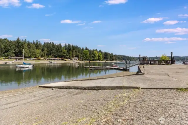 Community beach with boat launch, moorage, and picnic area