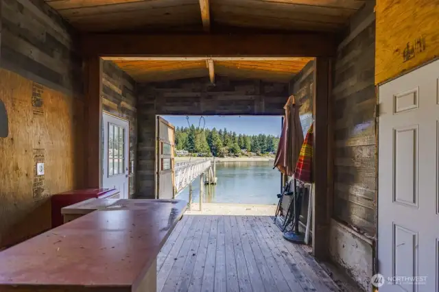 Casita / boathouse with bar and bath off of the dock, and an outdoor shower