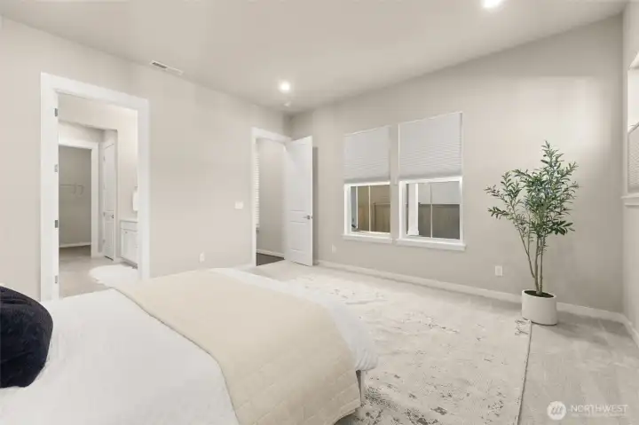 Retreat to your spacious and serene primary suite.