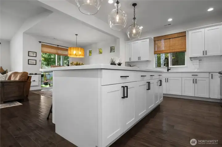 Large island with pull out shelves in cabinets