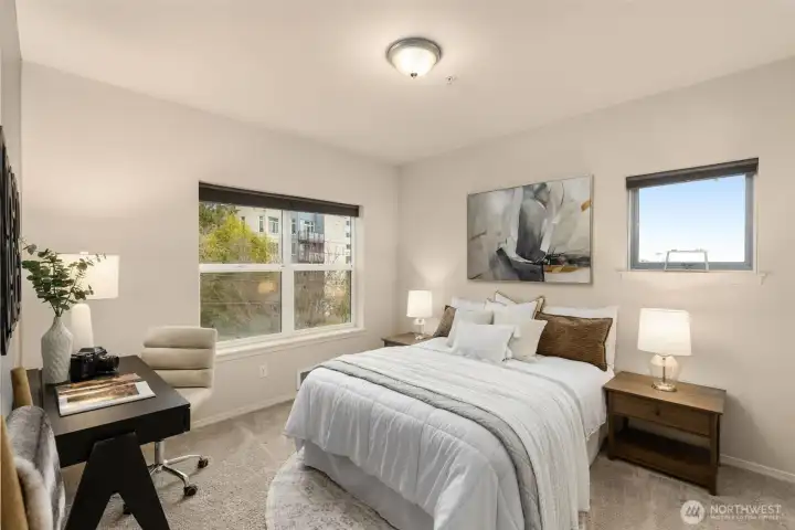 Oversized bedroom with space for desk or dresser (not needed because there's enough storage already!)