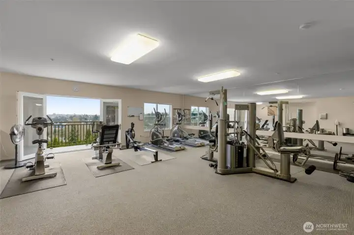 Fully equipped fitness center located on top floor overlooking golf course and downtown.