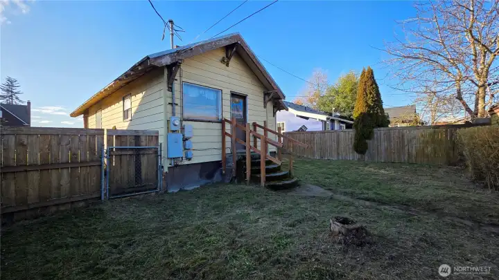 Back yard is full fenced with gates
