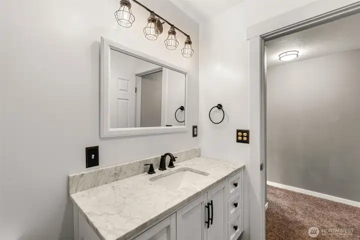 Updated bath with walk-in shower.