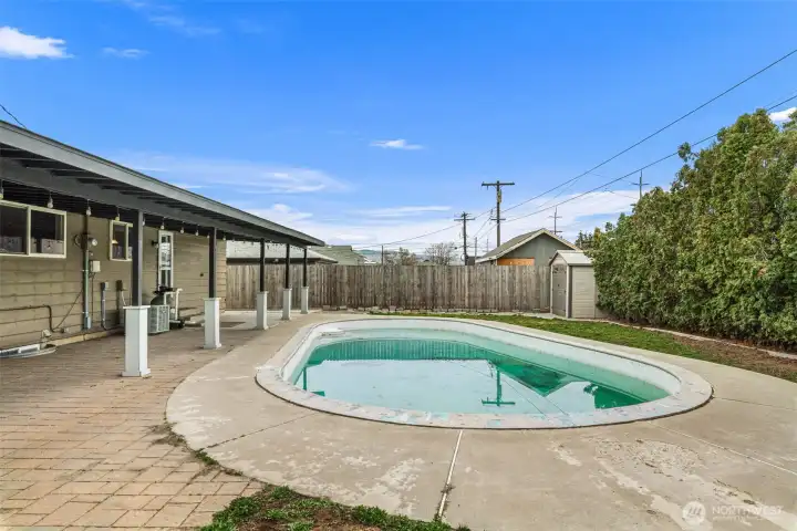 In ground swimming pool.
