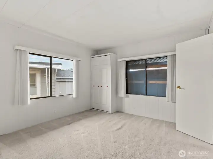 The primary suite has plenty of space for all of your furniture.