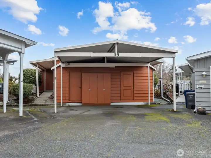 The carport is great for 2 cars and has even more storage space.