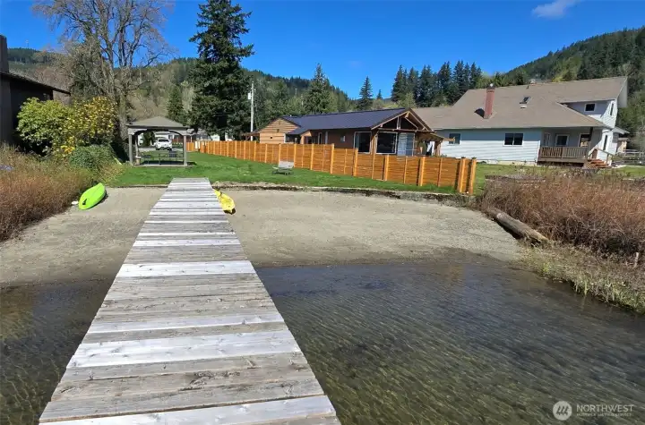 Expansive Lake Samish and mountain views highlight the natural beauty surrounding this Whatcom County location