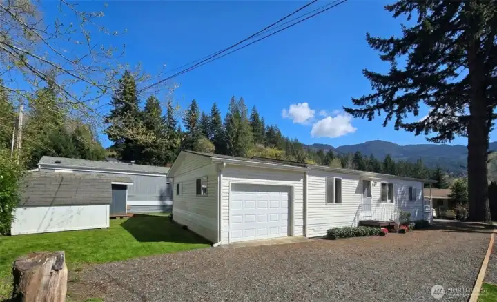 Front exterior showcasing covered porch entry