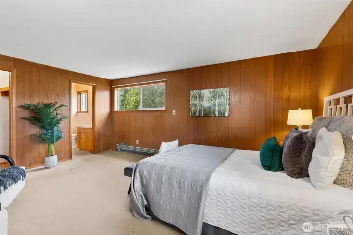 Another view of the Primary Bedroom. The door to the left is a walk-in closet; center doorway leads to the 3/4 ensuite bathroom.