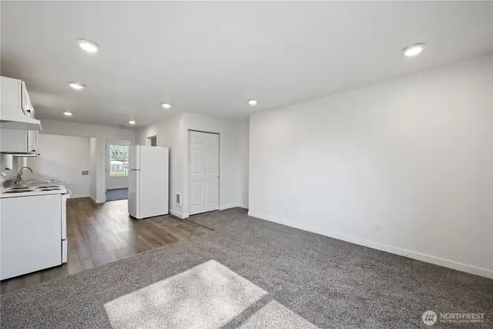 New carpet and Vinyl Plank Flooring throughout