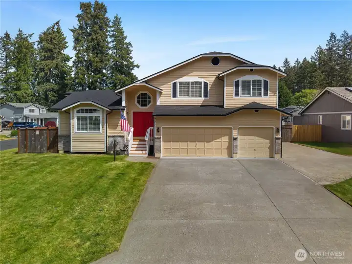 Arrive home to fresh exterior paint, a new 50-year roof, and an attached 3-car garage.