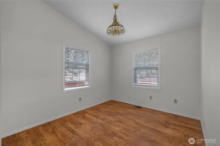 Main floor Den - Design the perfect guest room, office, or quiet retreat in this bright flexible space.