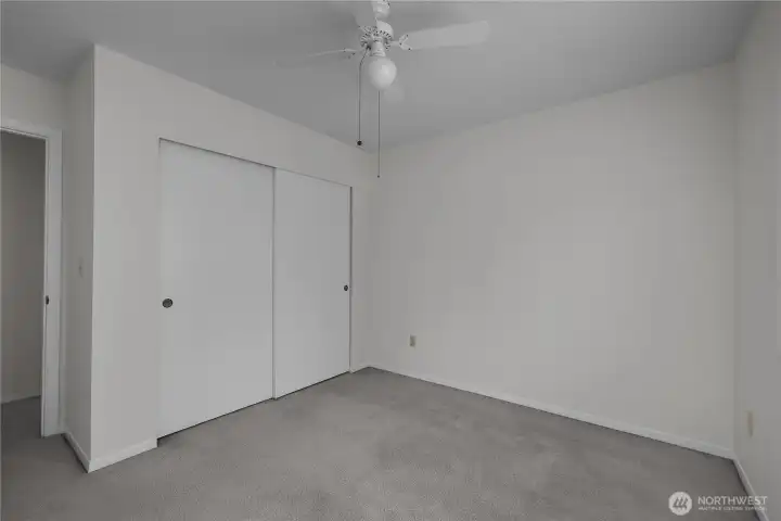 BR 3 - Settle into this bright bedroom with closet storage and a simple, functional layout.
