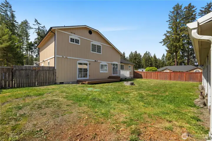 Enjoy the huge fenced backyard with deck access, room to play, garden, entertain, or relax.