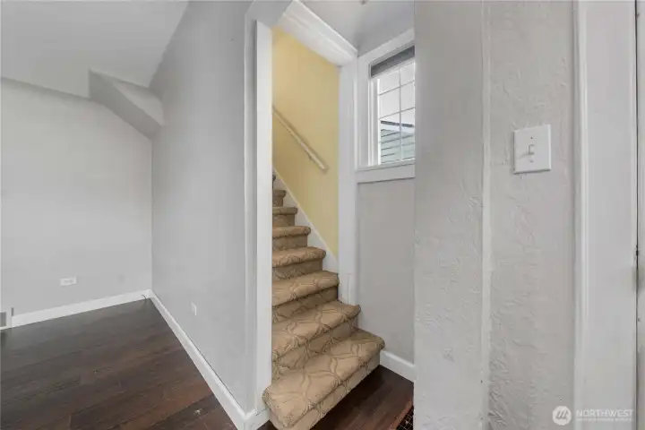 Front Entry & Stairway to 2 Bedrooms
