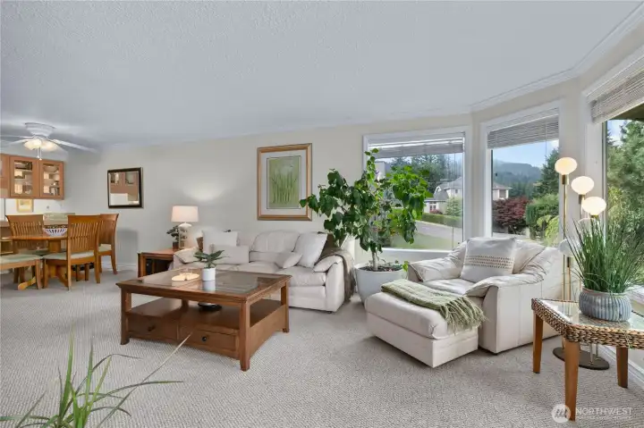 Expansive windows throughout the home provide natural light and a strong connection to the surrounding landscape. Expansive windows throughout the home provide natural light and a strong connection to the surrounding landscape.