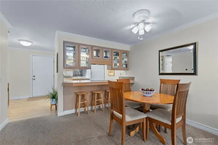 Dining area positioned adjacent to the kitchen and living room, ideal for casual meals or entertaining guests. Dining area positioned adjacent to the kitchen and living room, ideal for casual meals or entertaining guests.
