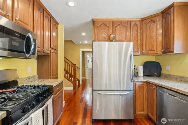 A closer look at the kitchen layout highlights its practical work triangle and exceptional storage.
