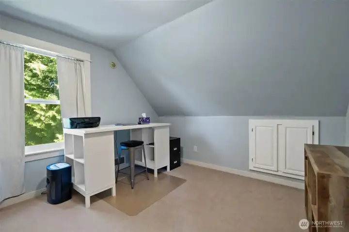 Perfectly suited for today's work-from-home lifestyle, this bright secondary bedroom is currently configured as an efficient home office.